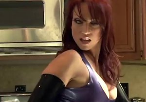 Latex-wearing Nicki Hunter gets fucked in the kitchen