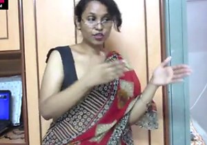 Amped up Indian lady showing her mature body