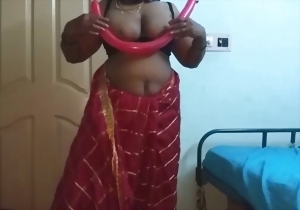 A beautiful big-boobed lady is having fun with her wet pussy