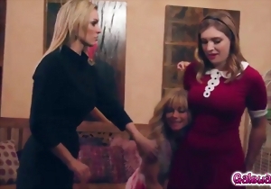 Three cute-looking ladies are getting naked in the bedroom